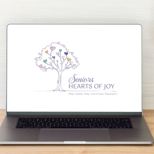 A computer screen with the Seniors Hearts of Joy logo