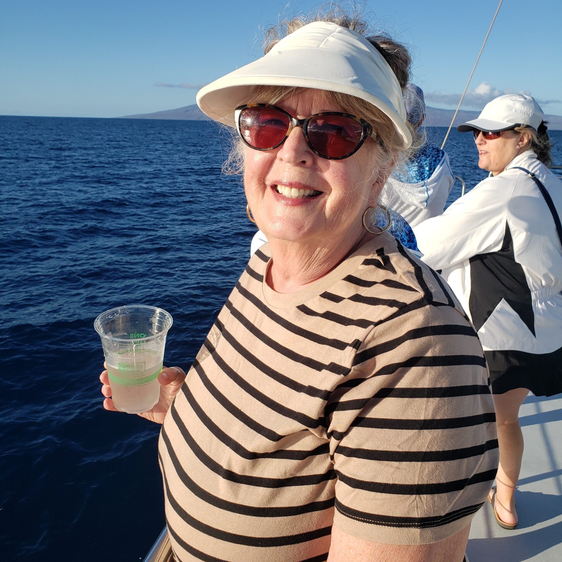 Carolyn Hadock - Founder of Seniors Hearts of Joy on a boat
